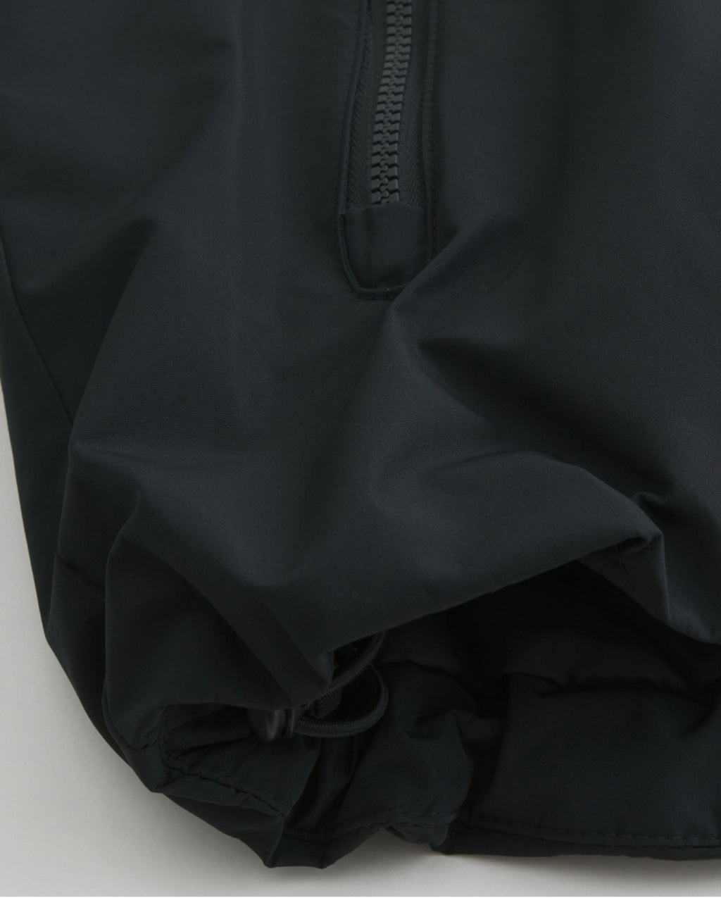 Veste coquille à capuchon