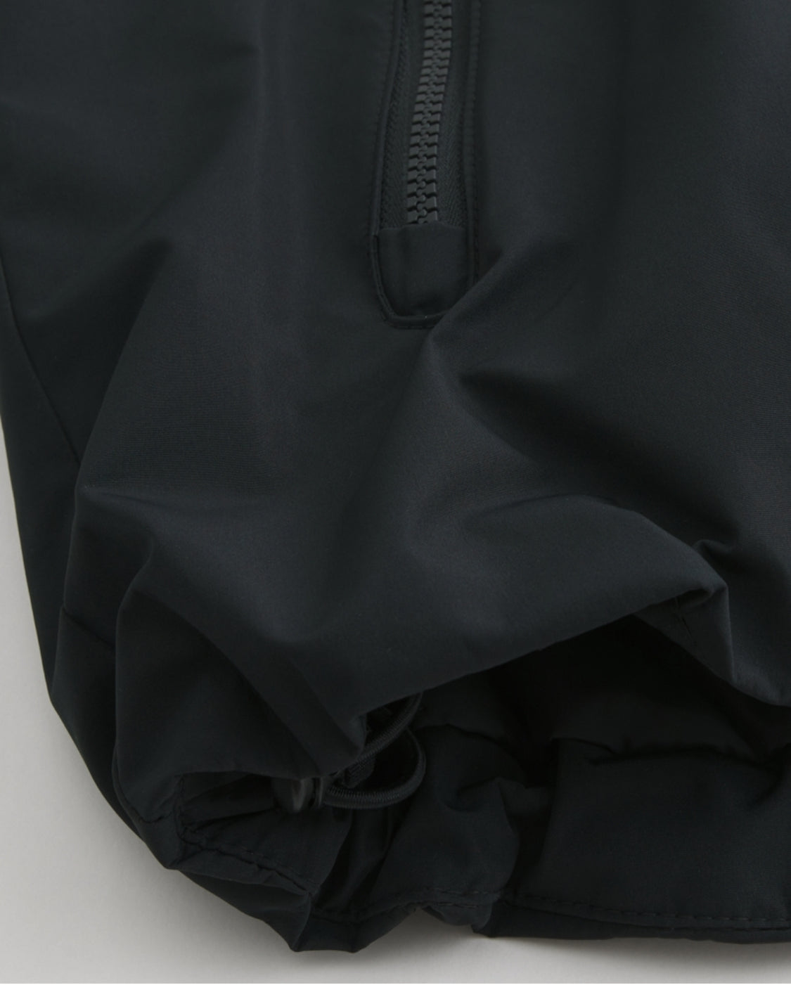 Veste coquille à capuchon