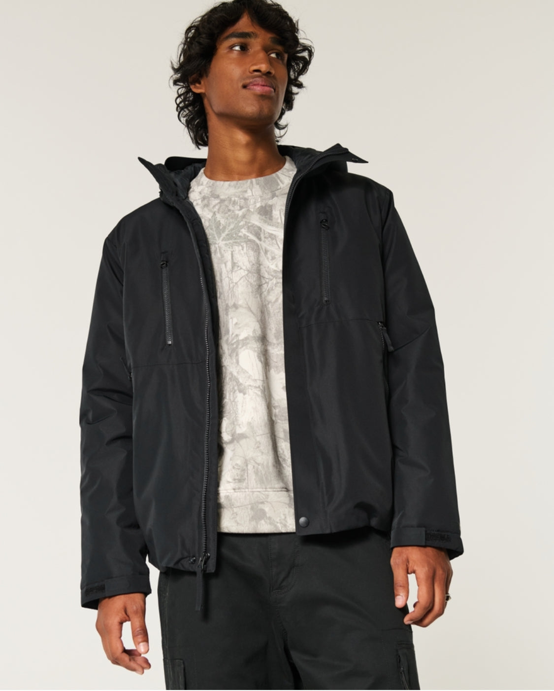 Veste coquille à capuchon