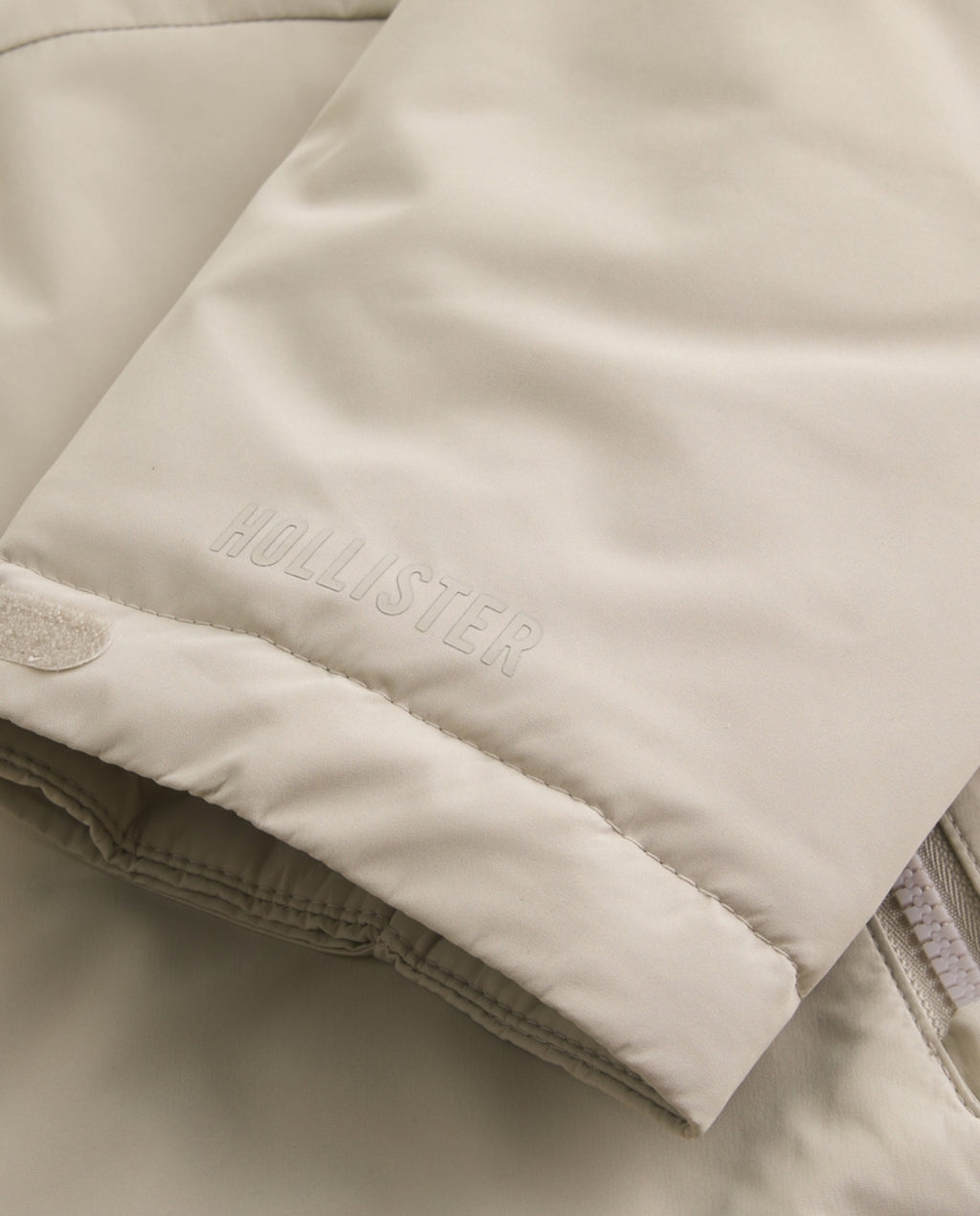 Veste coquille à capuchon