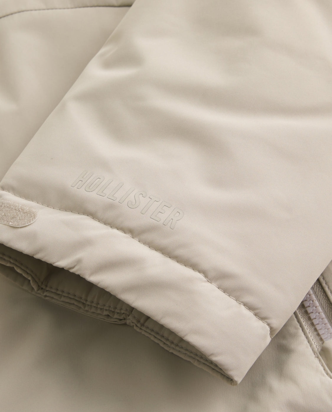 Veste coquille à capuchon