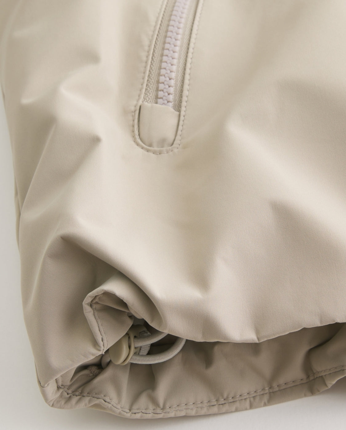 Veste coquille à capuchon